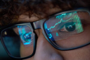 young business man looking at trading charts refle 2026 03 18 16 03 21 utc